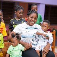 Nursery teacher and toddlers